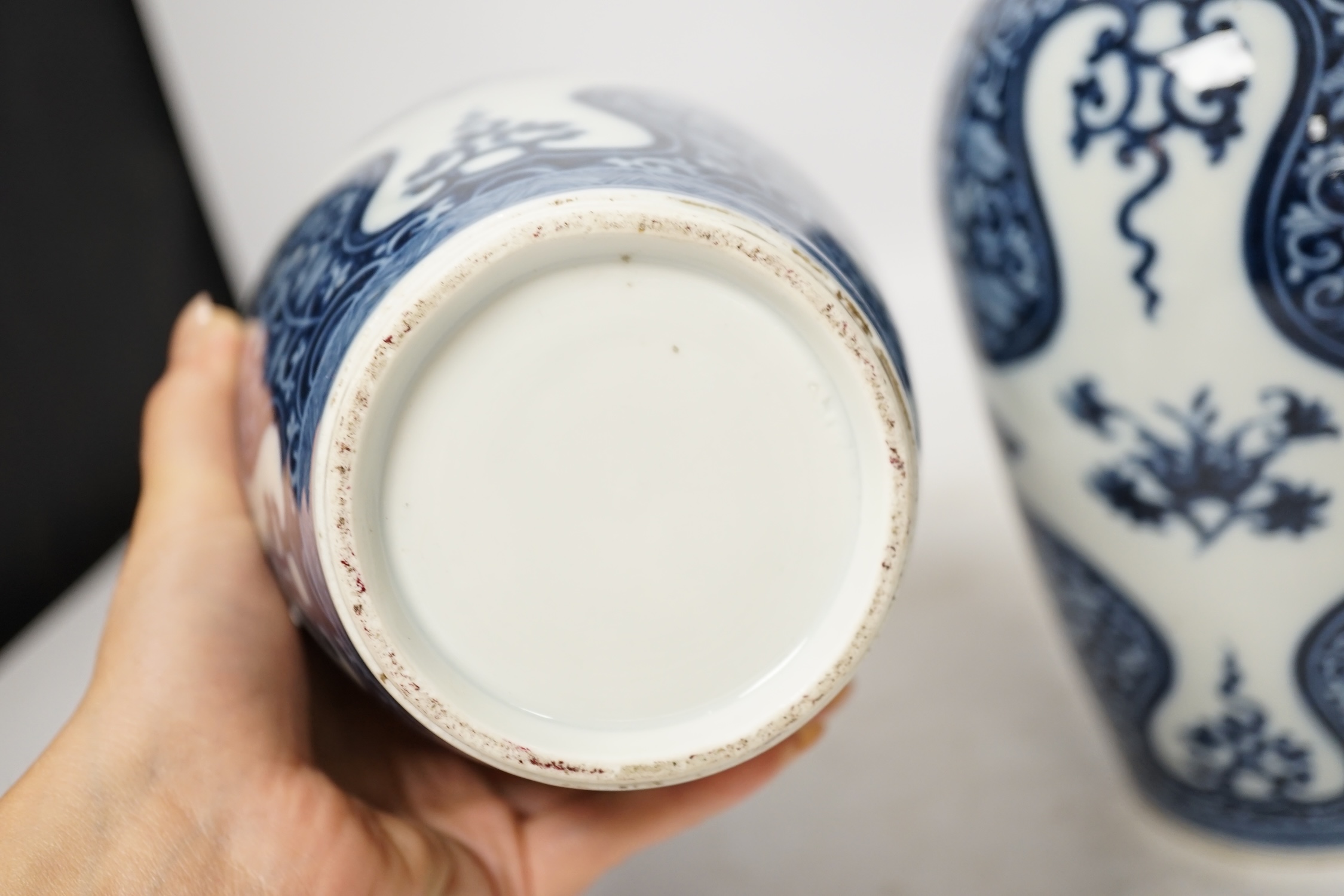 A pair of Samson of Paris blue and white vases, in Kangxi style 23cm high. Condition - good